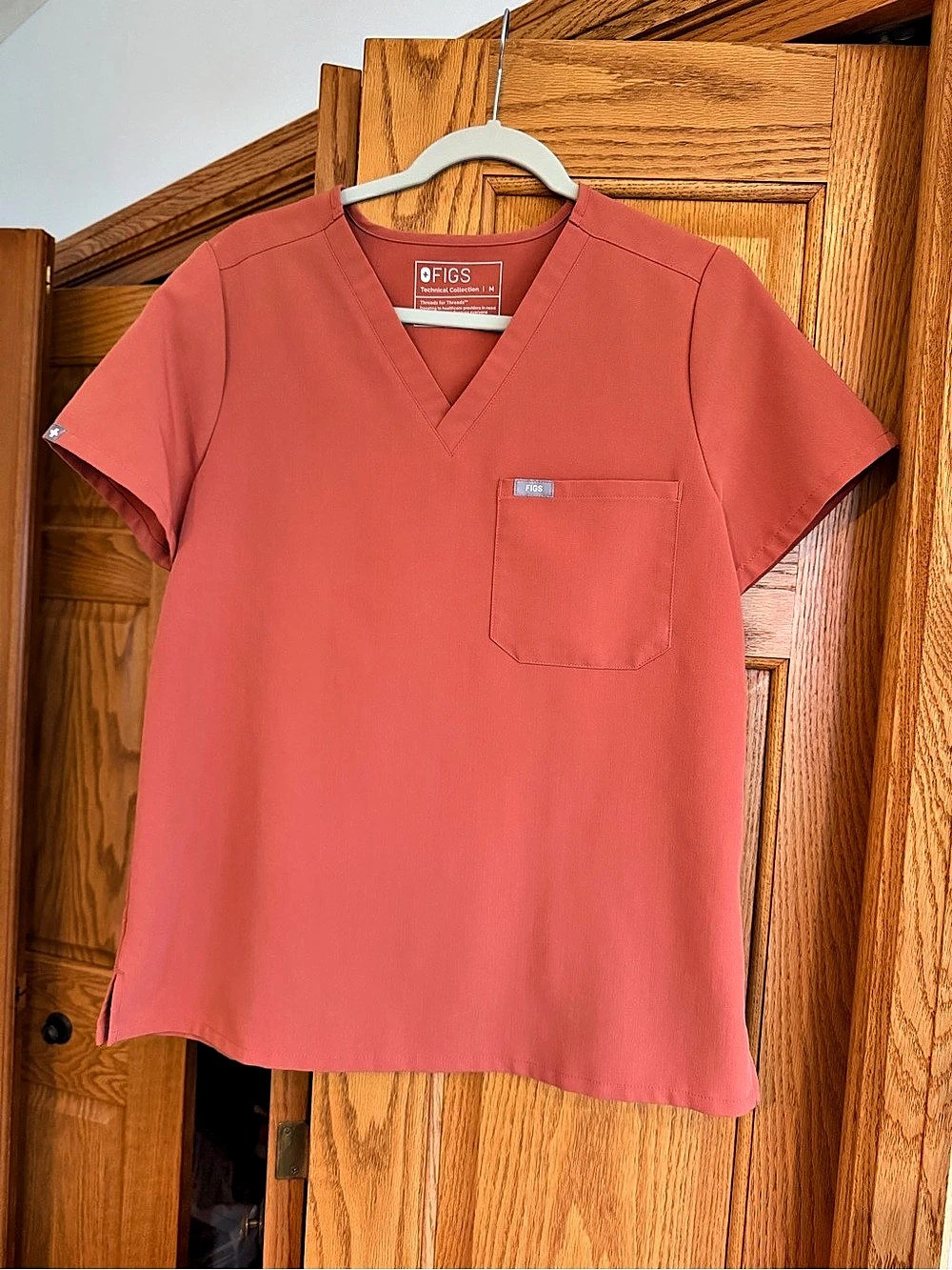 FIGS Technical Collection scrub top V-Neck in orange Size Medium
